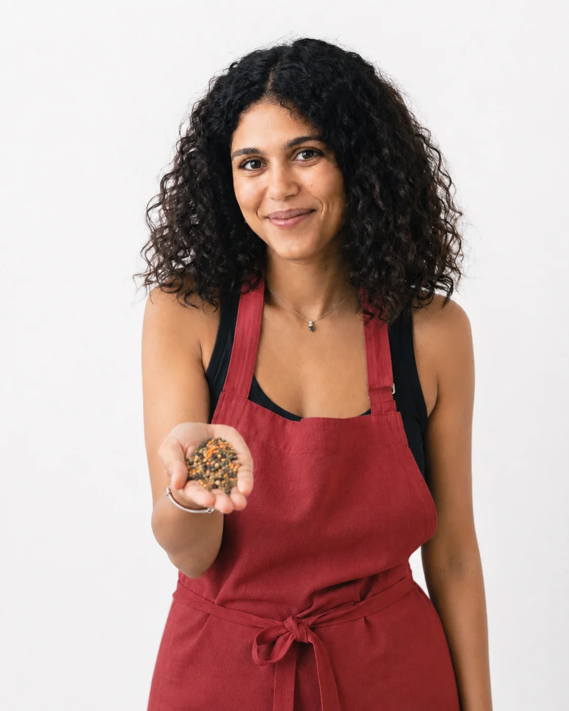 Rebecca Mardi holding kitchari ingredients.